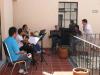 Simon coaching one of the brass quintets